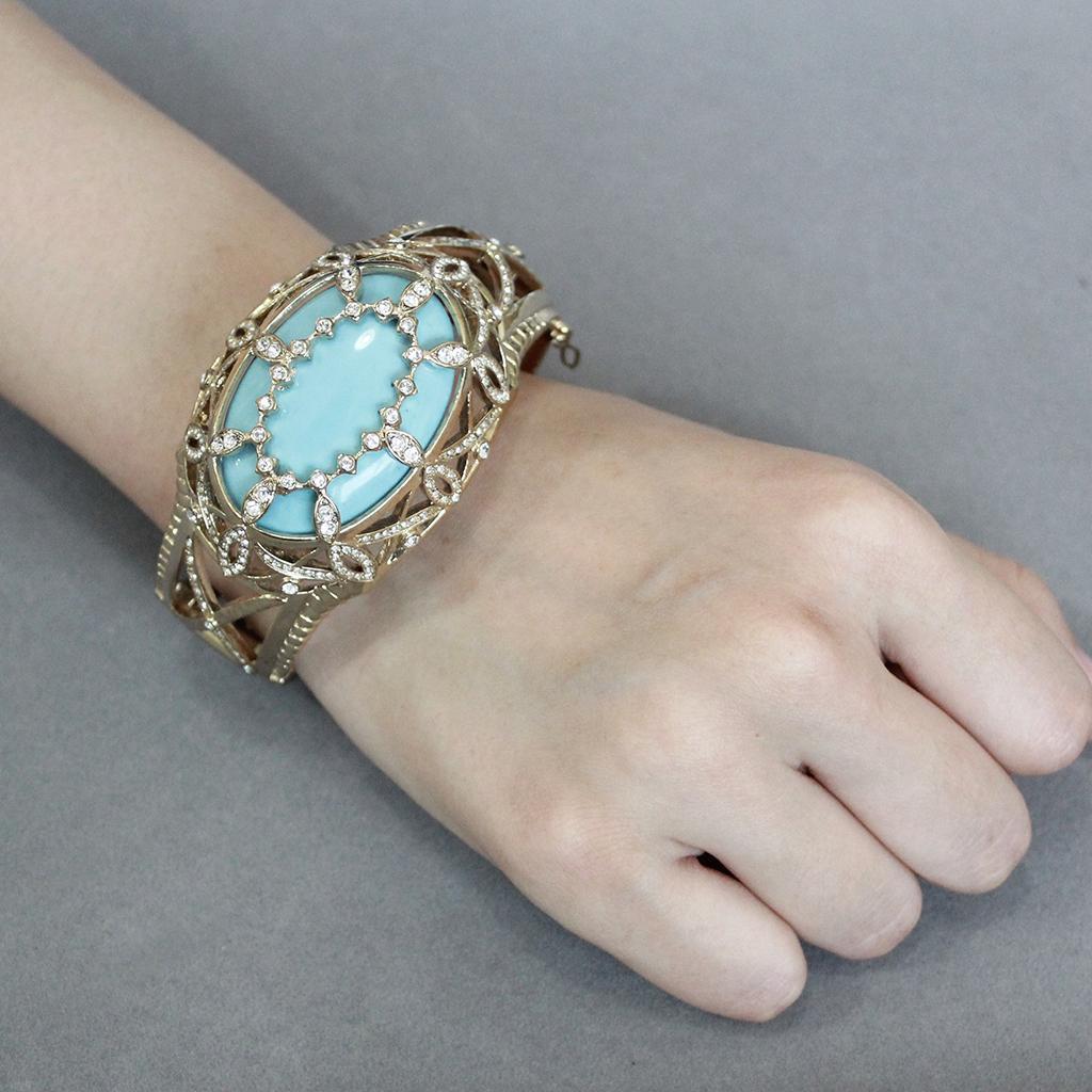 LO4348 - Gold Brass Bangle with Synthetic  in Sea Blue Elsy Style Bangle